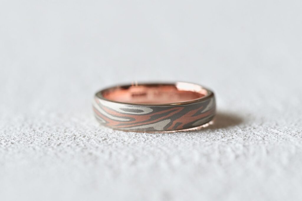 Three-tone Mokumegane ring crafted from K14 white gold, K14 rose gold and silver