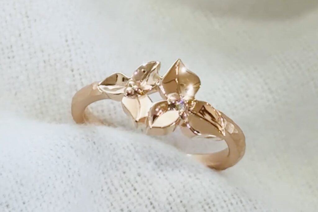 Bespoke jewellery ring inspired by bougainvillea flowers and crafted in rose gold